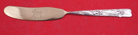Butter Spreader flat handle from Roslyn Berlin collection pictured in the book 